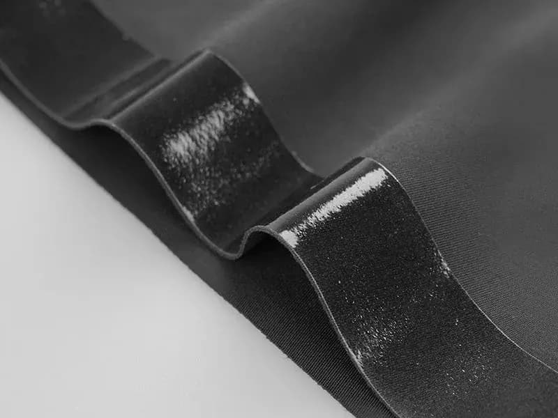 Close-up of a silicone leg gripper on a bib short